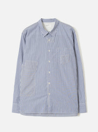 Navy and white vertical-stripe cotton shirt, flat lay on a light grey seamless backdrop. Spread collar, button-through placket with cream buttons, one chest patch pocket and two large front patch pockets. Long sleeves with buttoned cuffs. Topstitched hem with a curved silhouette. Universal Works label visible at the collar.