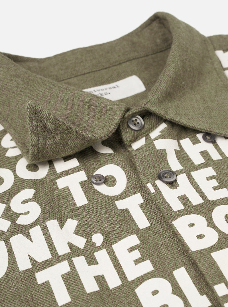 Close-up detail view of the Olive Monty Cotton Tencel Standard Shirt on a white background, showing the buttoned cuff, sleeve slit detail, and soft cotton-tencel material texture.