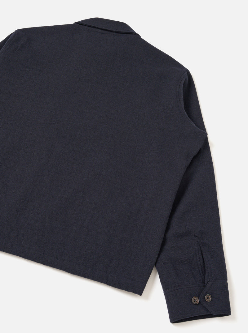 A back view of the Dark Navy Robin Wool Mix Club Jacket set against a plain off-white studio background, showcasing the clean rear yoke, straight hemline, and premium dark navy wool-blend texture.
