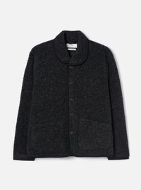 Charcoal boucle style fleece Lancaster jacket laid flat on a light grey studio backdrop. Features a shawl collar with black trim, five-button front placket, two large patch pockets, and a ribbed hem. The textured boucle style fabric has a looped, marl appearance throughout.