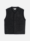 Charcoal boucle style fleece gilet laid flat on a light grey studio backdrop. V-neckline and armhole edges finished with black ribbed binding. Five dark buttons run down the centre front. Two patch pockets sit at the hem. A Universal Works woven label is visible at the inner neck.