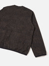 Full back shot of the Navy Deca Light Knit Cardigan set against a seamless white studio background. The image displays the flat back construction, shoulder seams, and smooth fine-knit finish of the dark navy cardigan.