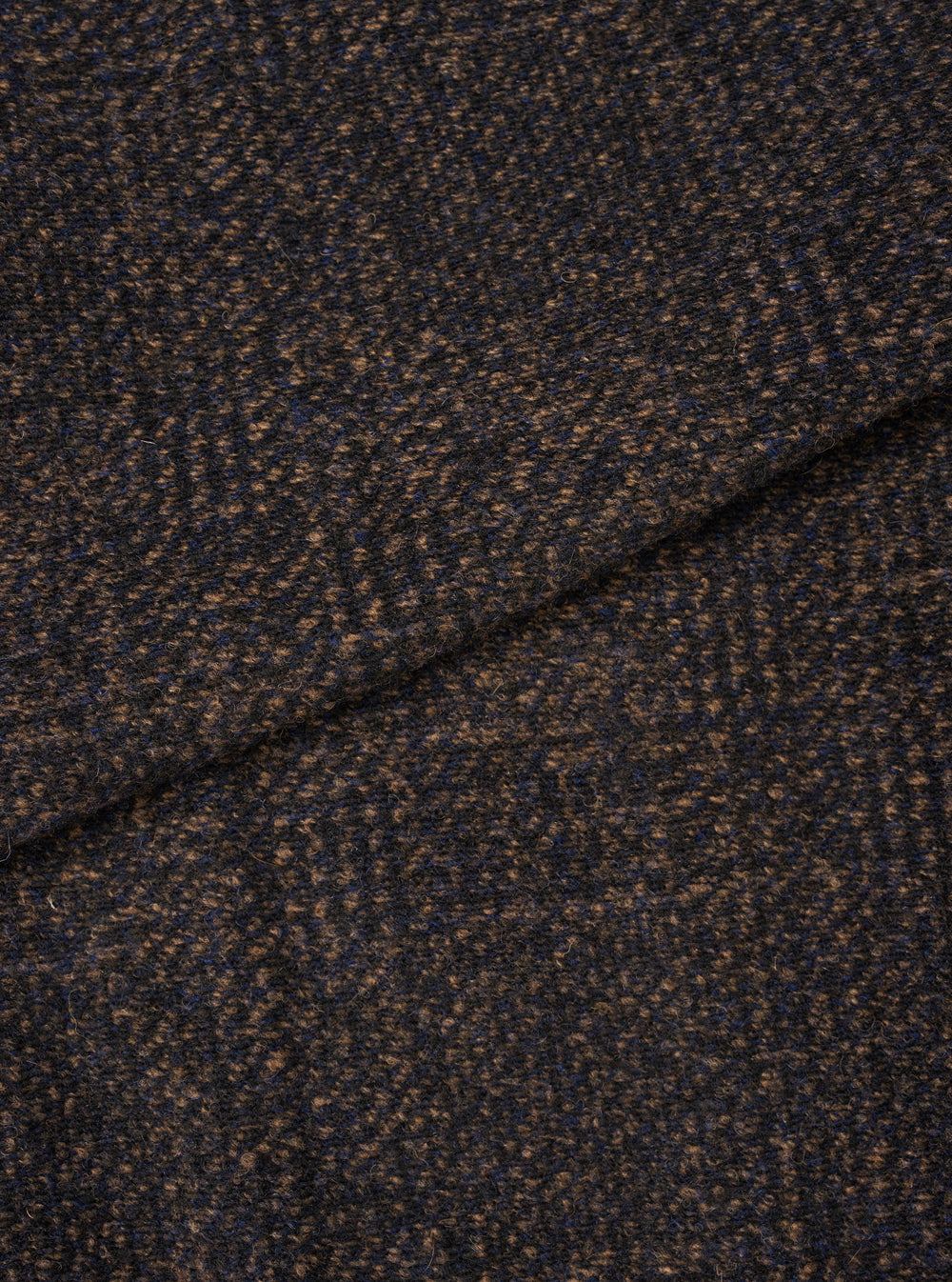 Extreme close-up fabric swatch of the Navy Deca Light Knit Cardigan on a white background. The image details the fine knit weave pattern, soft yarn texture, and rich dark navy color of the lightweight knit fabric.