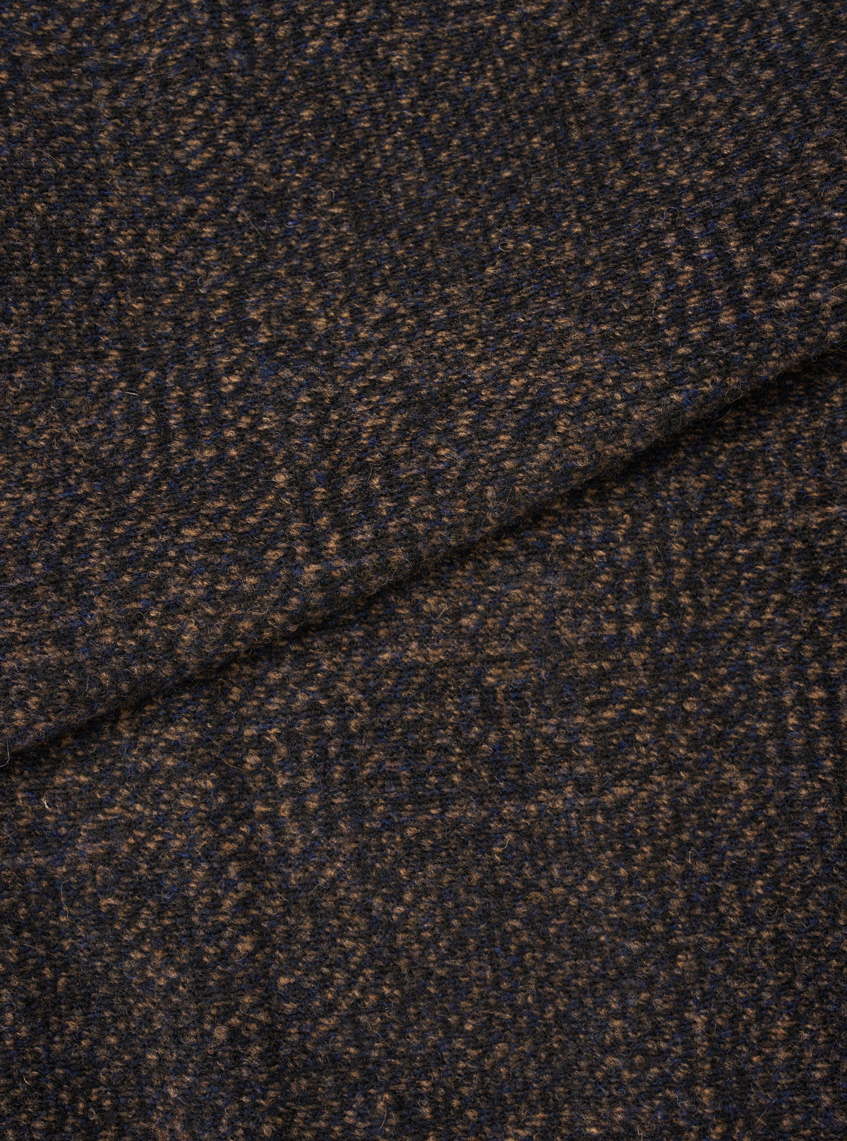 Extreme close-up fabric swatch of the Navy Deca Light Knit Cardigan on a white background. The image details the fine knit weave pattern, soft yarn texture, and rich dark navy color of the lightweight knit fabric.