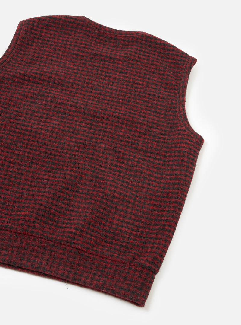 A full-length back view of a model wearing the Black/Red 533 Wool Mix Giacomo Tank Top against a neutral studio background, showing the sleeveless silhouette and back pattern of the wool mix vest.