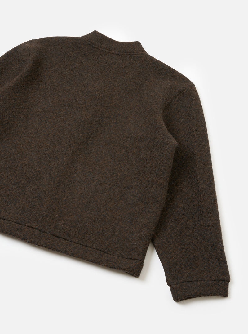 A rear view photograph of the Brown Raven Fleece Advance Cardigan against a clean white studio background, displaying the smooth back panel, neat collar trimming, and textured brown raven fleece weave.