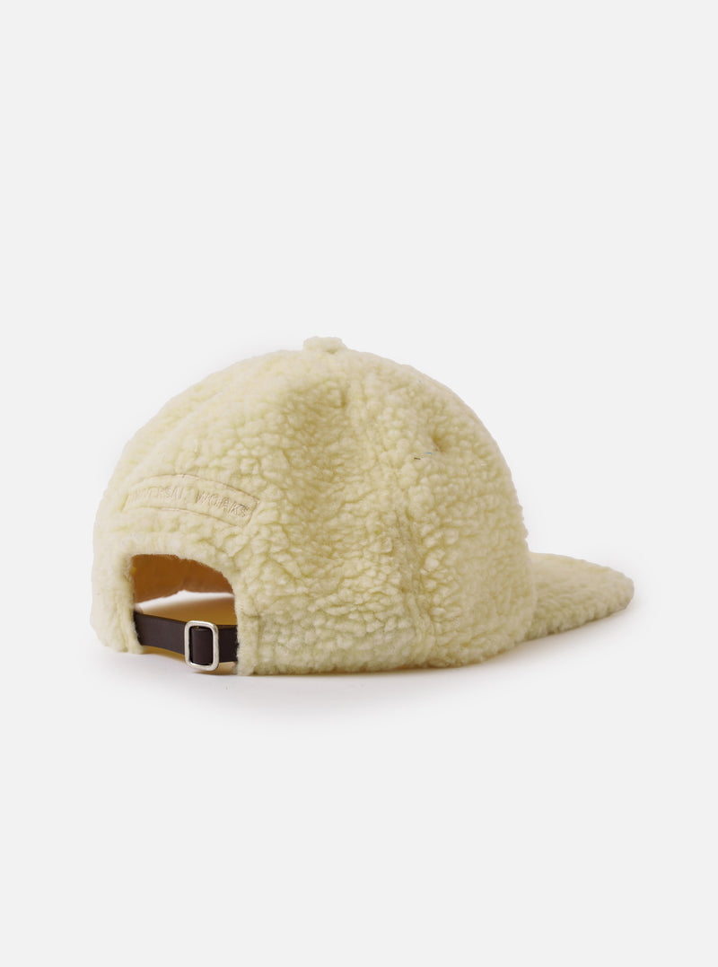 An image of the Ecru Galaxy Fleece Baseball Hat shown on a plain white background. The photo highlights the textured fleece material, wide peak, and adjustable strap with a metal buckle on the back of the cap.