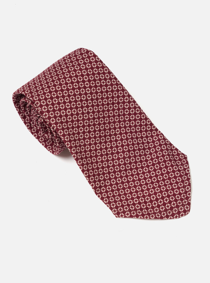 Close-up detailed view of the Brown Regal Cotton Tie on a neutral background, highlighting the textured fabric weave, neat side seam finish, and rich brown hue of the formal accessory.