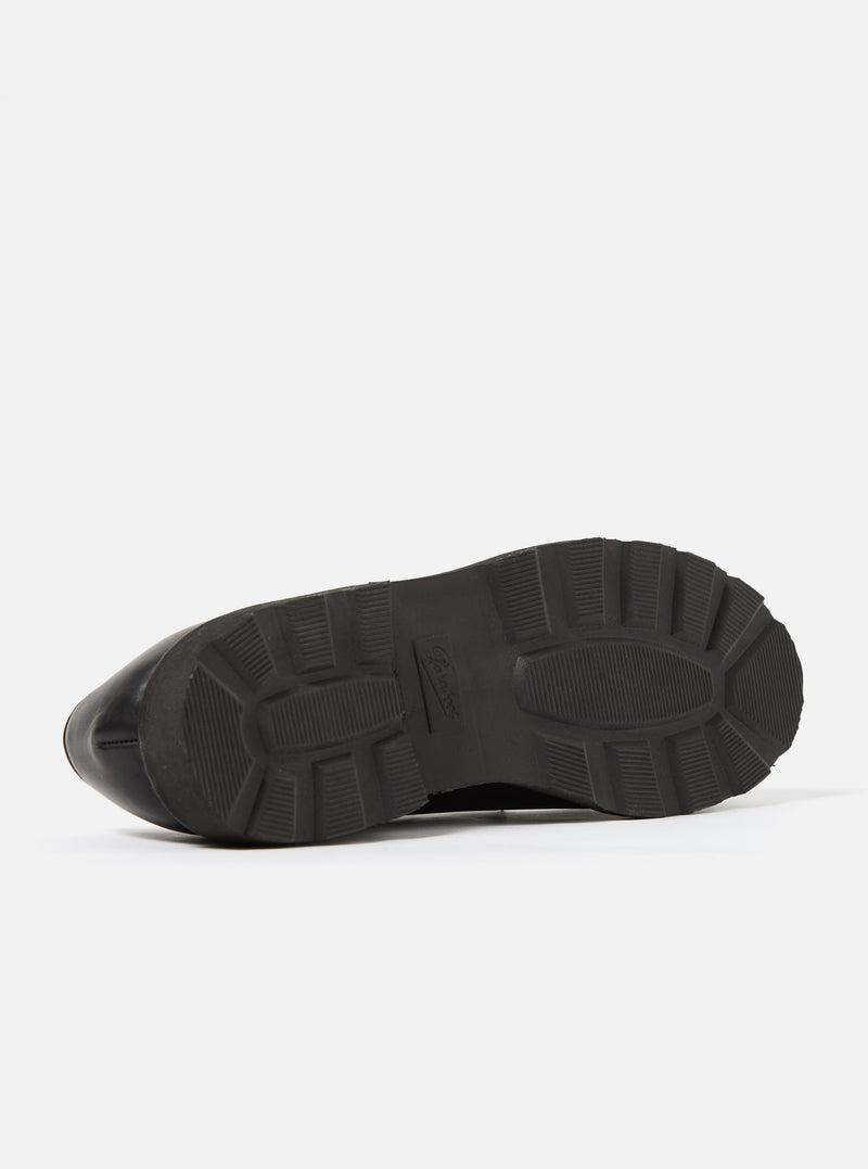 Close-up of the sole of a Paraboot Black Leather Michael Marche II shoe on a white background. The sole is black and has a lug pattern.