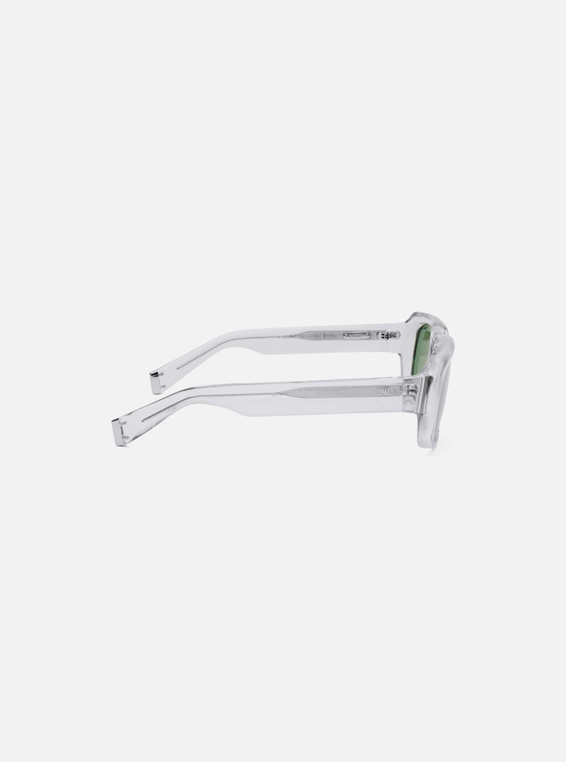 Side view of A. SOCIETY x Universal Works Grey Aberdeen Sunglasses on a white background. The frames are a translucent grey, and the lenses are green.