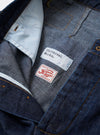 The Indigo Kaihara LT WT Denim Duke Pant is shown as a flat lay against a plain white background. The trousers feature a wide-leg, loose fit with distinct pleats at the waist and a classic button fly. The dark indigo lightweight denim fabric has a visible weave and clean finish.
