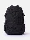 The F/CE. Black Recycled Nylon 420 re/cor Travel Backpack is shown as a flat lay against a white background. The backpack features a sleek, slightly shiny black finish with multiple functional front compartments, a top carry handle, and adjustable shoulder straps. The design includes various webbing loops and a prominent front pocket with vertical zip closures.