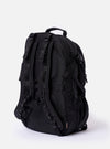 The F/CE.® Black Recycled Nylon 420 re/cor Travel Backpack is shown from a rear angle against a plain white background. The image highlights the ergonomic shoulder straps, a padded back panel made of technical mesh, and a top haul handle. A small brand label is visible on one strap.