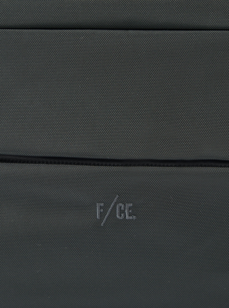 Close-up of the F/CE.® Grey 420 re/cor Sacoche showing the texture of the grey material and the subtle F/CE. logo. Studio shot.