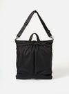 The F/CE.® Black Recycled Twill 3-Way Helmet Bag. A black twill bag with a shoulder strap, shot in a studio setting on a white background. 