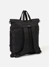 The F/CE.® Black Recycled Twill 3-Way Helmet Bag in black twill. Convertible straps for backpack, shoulder bag, or tote carry. Studio shot on white background.
