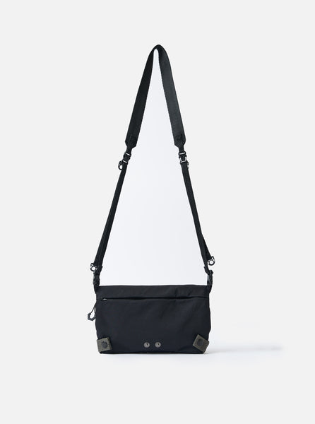 FLUTTER × HOODLUM | W Name Sacoche F/CE.® Black Nylon Textured Twill Drawstring Sacoche – Universal Works