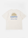 The Kappy White Sunny Wink Half Tee is shown from the back as a flat lay against a plain white background. The image highlights the garment's oversized, boxy silhouette, wide short sleeves, and simple ribbed crew neck. The white cotton fabric appears smooth and uniform across the rear of the shirt.