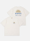 The Kappy White Sunny Wink Half Tee is displayed as a flat lay against a white background. The image shows two versions of the white cotton t-shirt side-by-side: one features a large blue graphic of a smiling sun on the chest, and the other features the same graphic in a smaller scale on the left breast. The t-shirts have a relaxed, oversized fit with wide sleeves and a crew neckline.