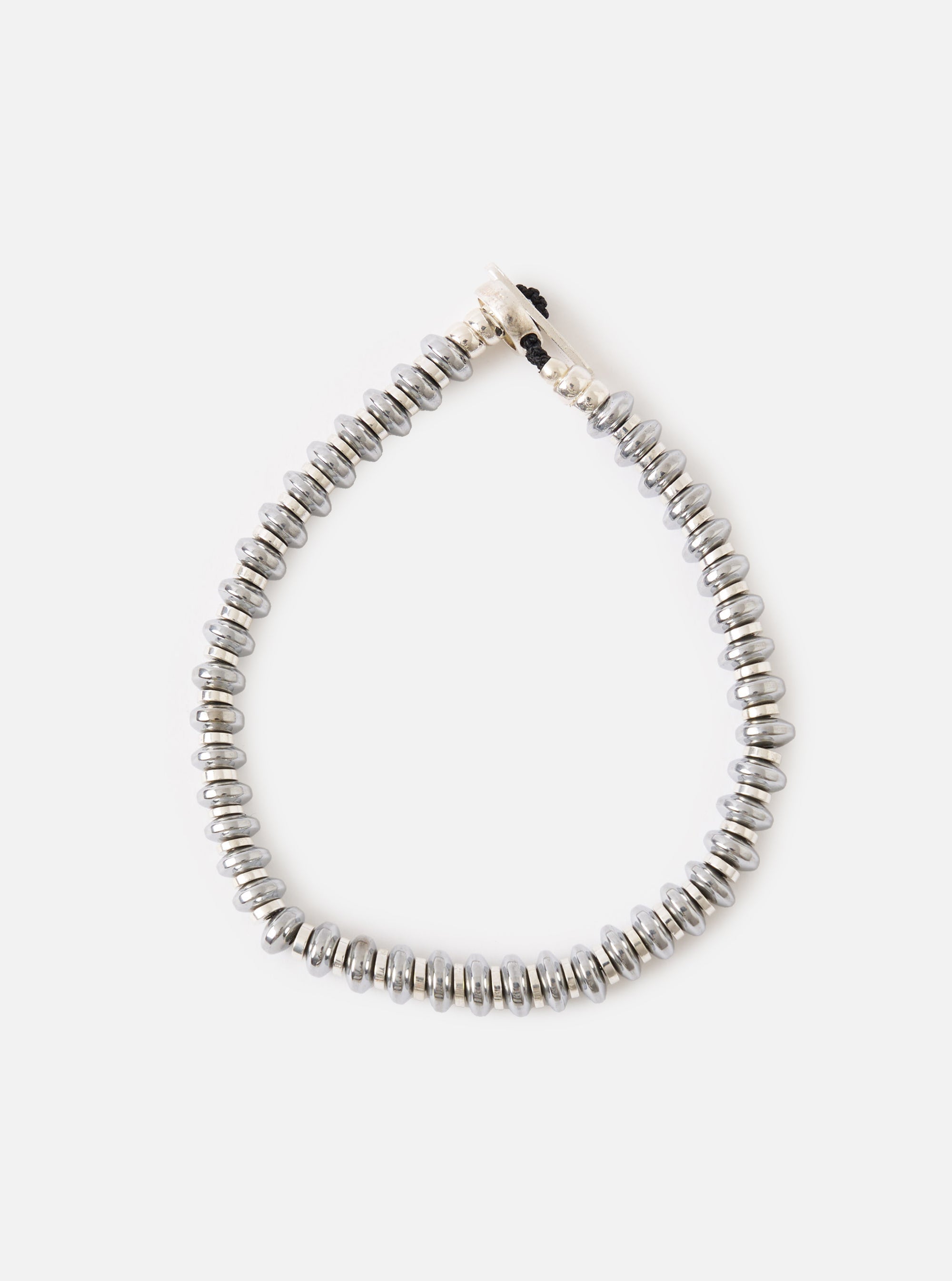 The Mikia Hematite Roundel Bracelet on a white background. The bracelet features gray hematite beads and a silver clasp.