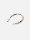 The Mikia Multi Hematite Roundel Bracelet on a white surface. The bracelet features colorful roundel beads separated by silver hematite rings.