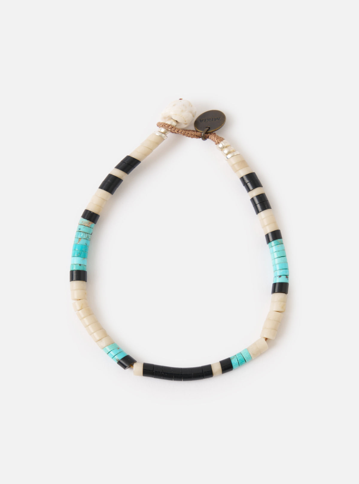 The Mikia Fossil Jasper/Turquoise Heishi Beads Bracelet on a white background. The bracelet features fossil jasper, turquoise, and black heishi beads.