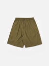 The master-piece x Universal Works Olive Recycled Poly Tech Pleated Track Short is shown as a flat lay against a white background. The shorts feature a super-loose silhouette with a single pleat on the front, an elasticated waistband with belt loops, and a button closure. Two diagonal hand pockets are visible at the sides.
