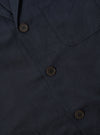 Close-up of the Navy Linen Slub Weave Three Button Jacket, showcasing the fabric texture, button details, and classic design. Shot on a flat surface.