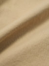Close-up of the Sand Military Cotton Simple Short, showcasing the fabric's texture and color in a studio setting.