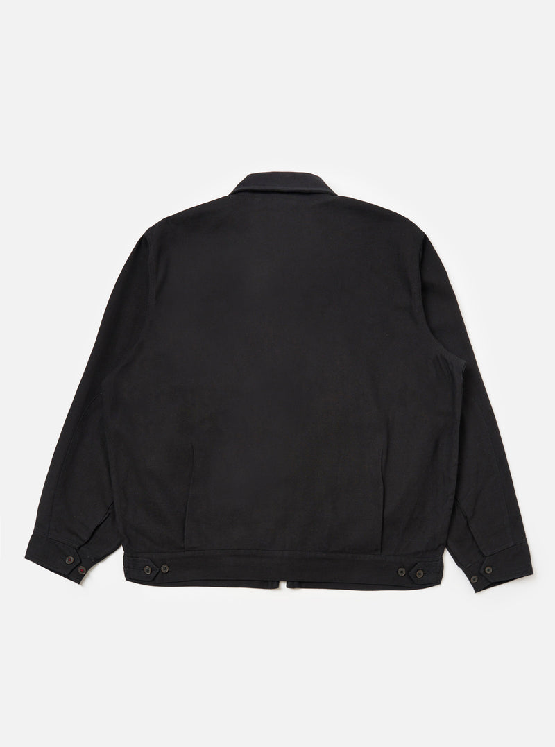 Back view of the Black Organic Canvas S130 Jacket on a white background. The jacket is made of black canvas material and has a classic fit.