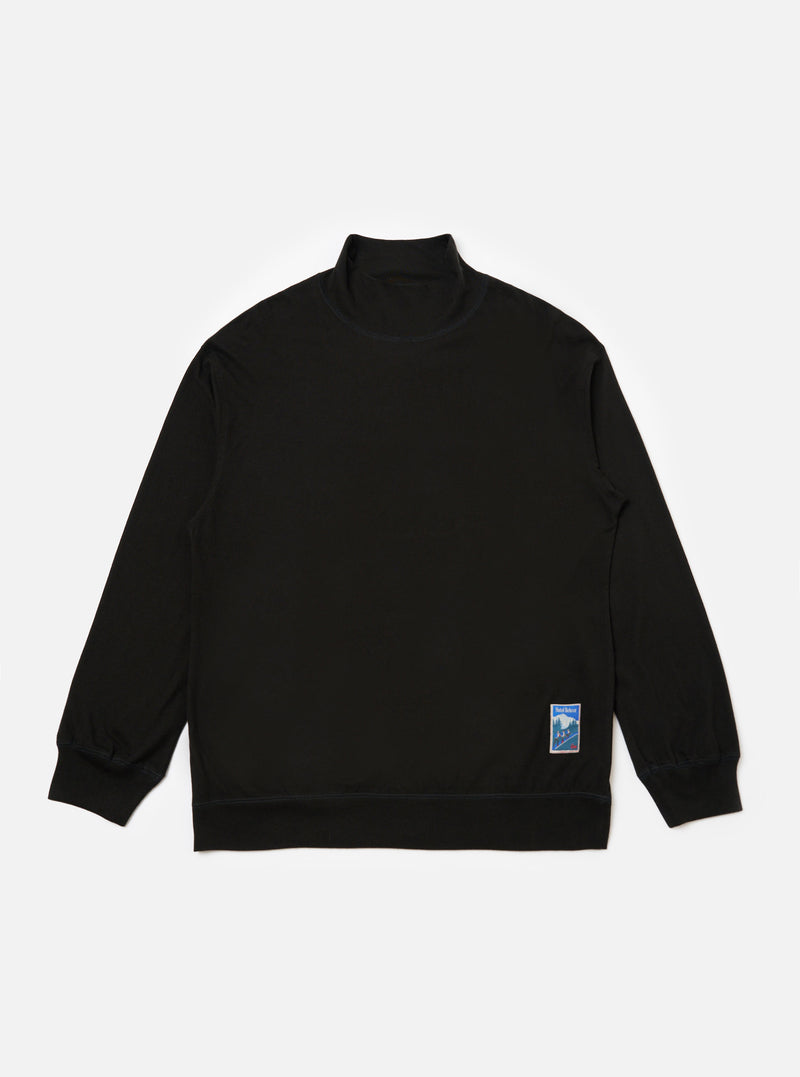 Studio shot of the Black Single Jersey Funnel Neck Tee, a long-sleeved black shirt with a funnel neck, laid flat on a white background. A small graphic is on the lower left.