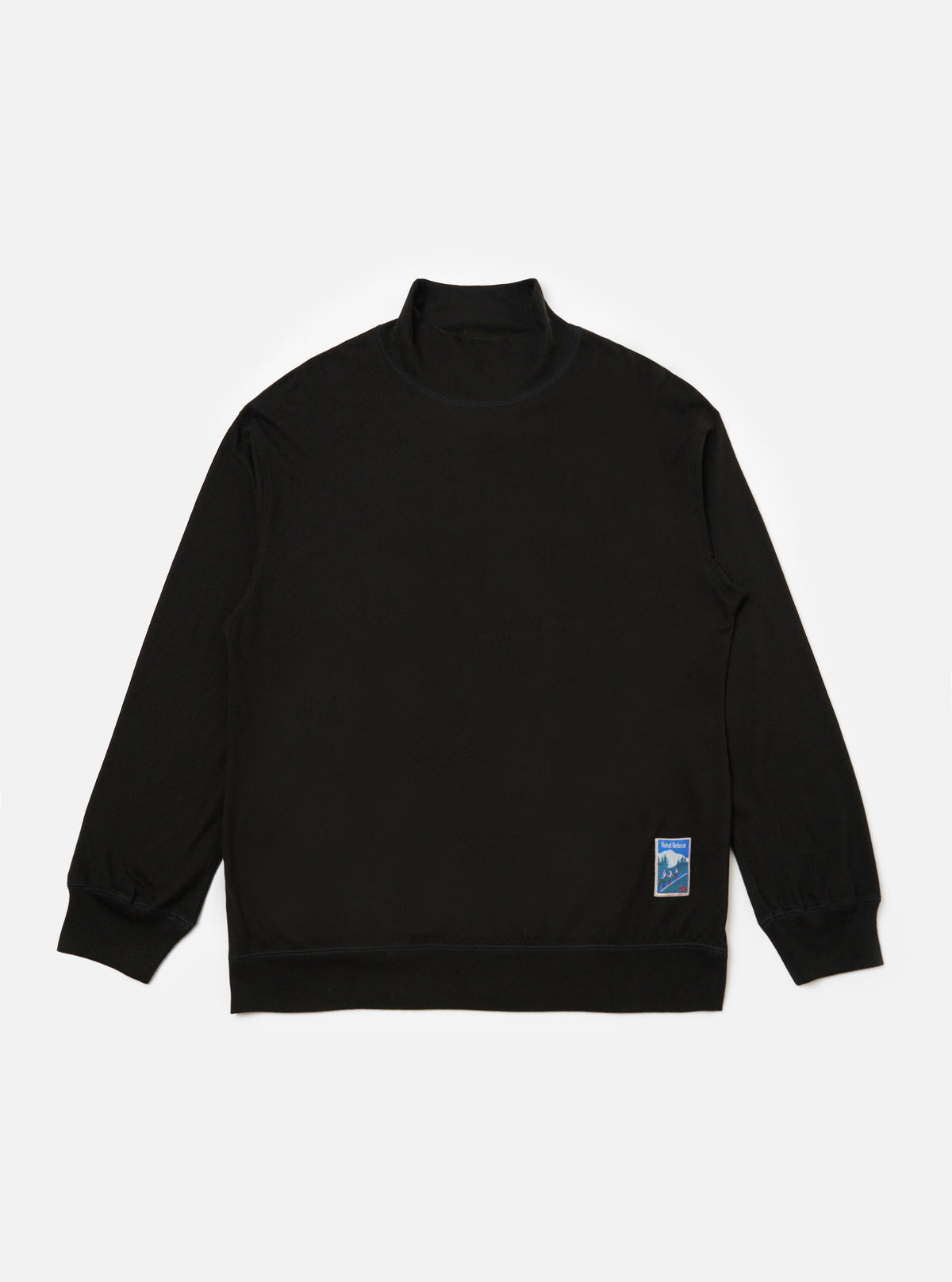 Studio shot of the Black Single Jersey Funnel Neck Tee, a long-sleeved black shirt with a funnel neck, laid flat on a white background. A small graphic is on the lower left.