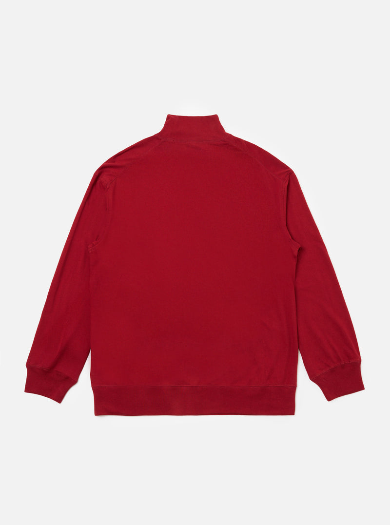 The back of a red single jersey funnel neck tee, laid flat on a white background. The tee has long sleeves and a ribbed hem and cuffs.