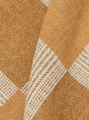 Close-up of the Sand Japanese Patchwork Easy Jacket, showcasing the tan and cream herringbone pattern. The fabric is softly folded, highlighting the texture.