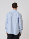 Back view of a model wearing a Blue Office Stripe Square Pocket Shirt on a white background. The shirt has a relaxed fit.