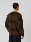 Back view of a model wearing the Brown Alps Fleece Zip Liner Jacket. The jacket is brown fleece, worn over a tan shirt. Shot against a white background.