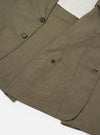 The Olive Linen Slub Weave Two Button Jacket is shown in a detail view as a flat lay against a plain white background. The image highlights the textured slub weave of the olive green linen-blend fabric and the construction of the straight side flap pockets and the two-button front closure.