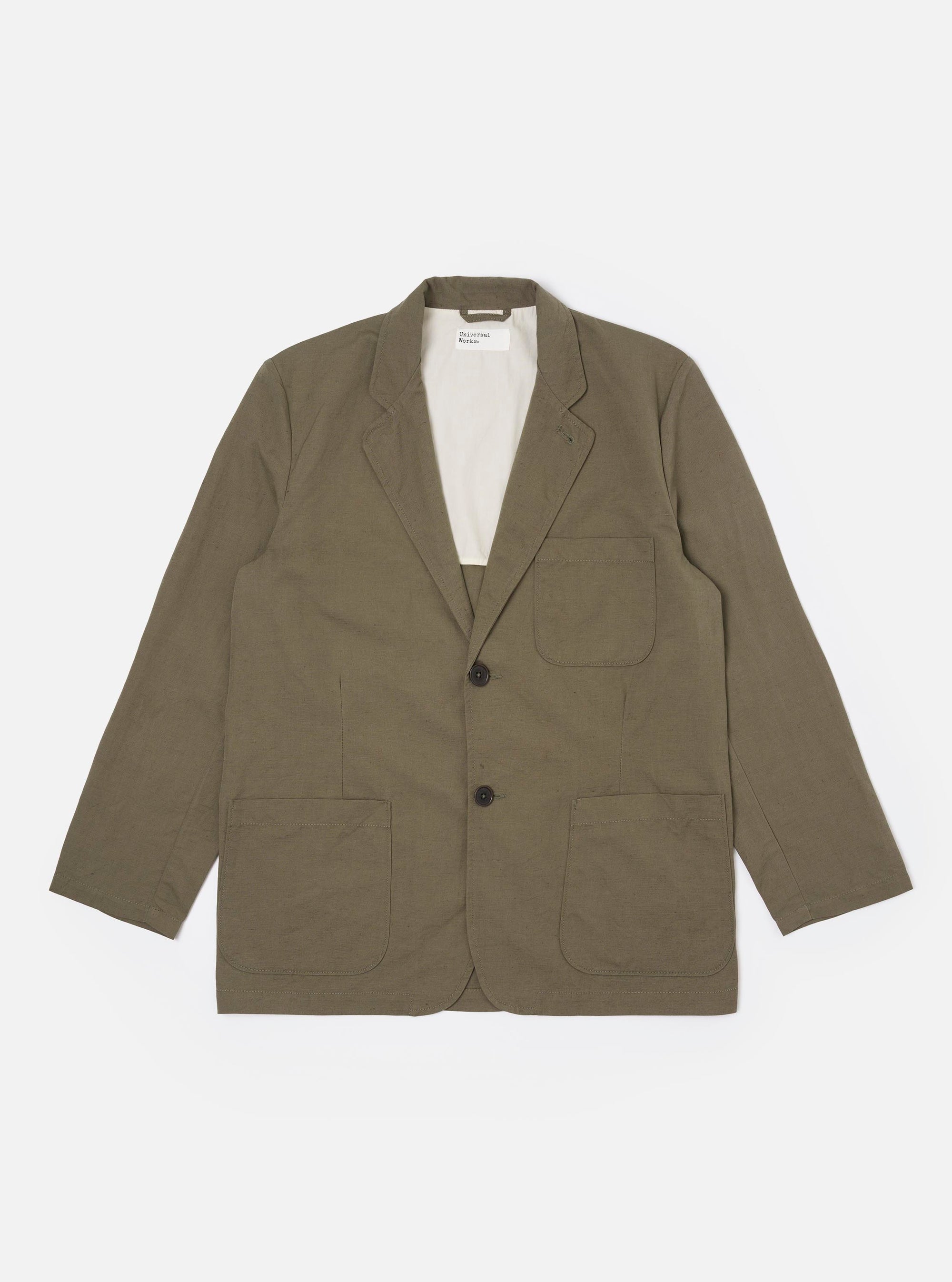 The Olive Linen Slub Weave Two Button Jacket is shown as a flat lay against a white background. The jacket features a relaxed fit with a two-button front closure, a long and wide notch lapel, two lower patch pockets, and one chest patch pocket. The fabric has a visible slubby texture from the linen-cotton blend.