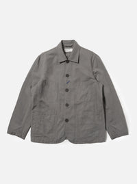 The Mid Grey Linen Slub Weave Bakers Jacket is shown as a flat lay against a plain white background. The jacket features a five-button front closure, a structured collar, and four asymmetrical patch pockets on the front, including one with a buttoned flap. The mid-grey fabric has a visible slubbed texture from the linen and cotton blend.