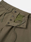The Olive Linen Slub Weave Oxford Pant is shown from a rear three-quarter angle as a flat lay against a plain white background. The image highlights the relaxed, wide-leg fit and the textured appearance of the olive green linen slub fabric. A single rear patch pocket with a button closure is visible on the right side.