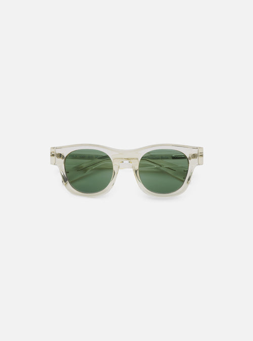Close-up of A. SOCIETY x Universal Works Honey Stanley Sunglasses. Clear frame, green lenses. Shot on a clean white background.