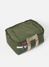 Topologie x Universal Works Rifle Green UW Tech Summit Duffle Large on a white background. The olive green bag has beige straps and branded patches.