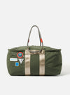 Topologie x Universal Works Rifle Green UW Tech Summit Duffle Large on a white background. The bag is olive green with beige straps and rope handles. Patches are visible.