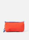 The Topologie x Universal Works Red UW Tech Bottle Sacoche Medium. Red tech fabric with blue trim. Studio shot on white background.