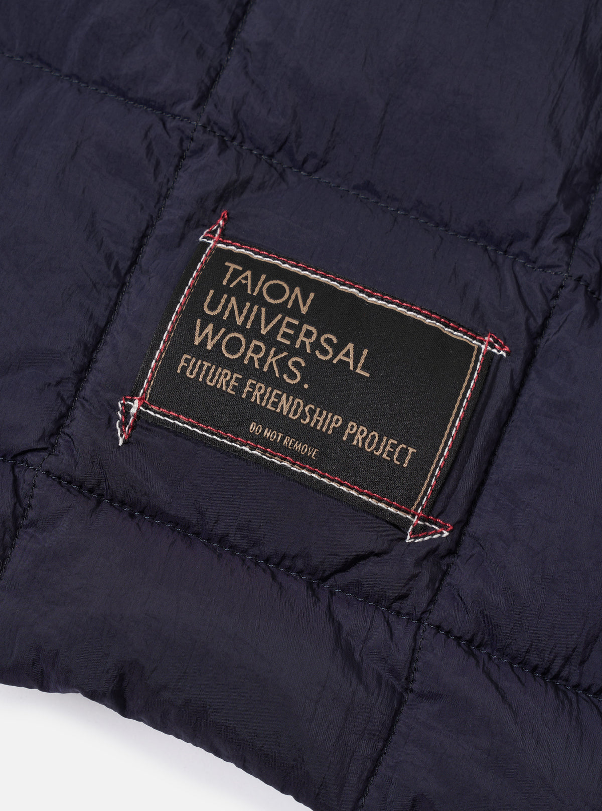TAION x Universal Works Navy Nylon Soft Shell Down Rams Jacket