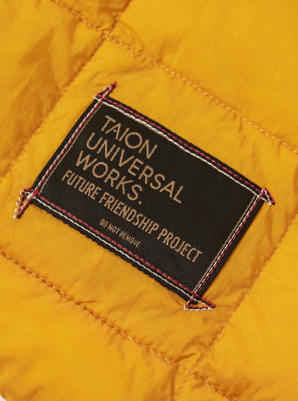 TAION x Universal Works Yellow Nylon Soft Shell Down Rams Jacket