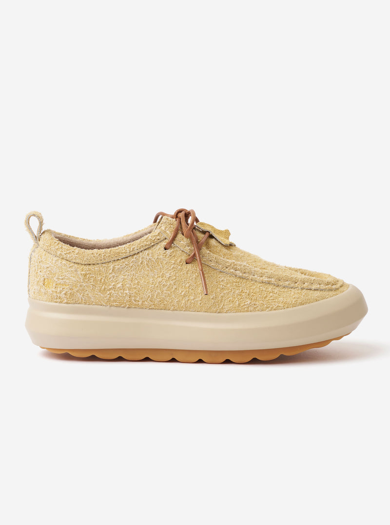 The Wander etc. FD/08 Low in Dune/Gum Hairy Suede is shown as a side profile studio shot against a plain white background. The shoe features a textured, dune-colored hairy suede upper, slim tonal laces, and a chunky gum-colored rubber outsole.