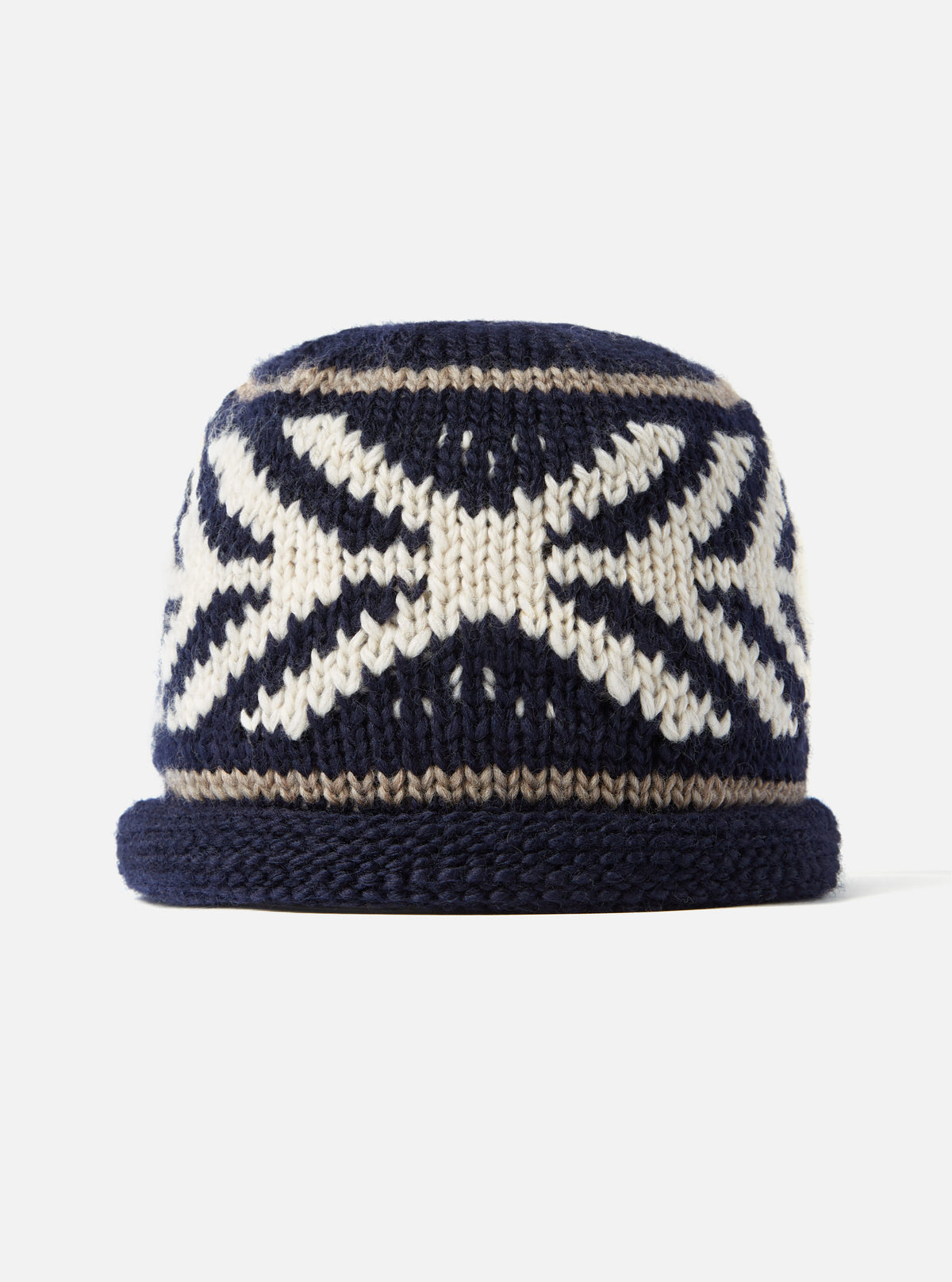 Close-up detail shot of the cableami® Navy Wool Jacquard Watch Cap on a plain white background, highlighting the intricate knit pattern, deep navy wool fabric, and textured turn-up cuff.