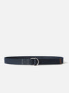 The Navy Canvas O Ring Belt on a white background. The belt is navy with a silver O ring and a brown leather accent.