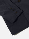 Close-up of the Navy Linen Slub Weave Manor Jacket sleeve, showcasing the fabric texture, brown buttons, and tailored fit against a clean white background.